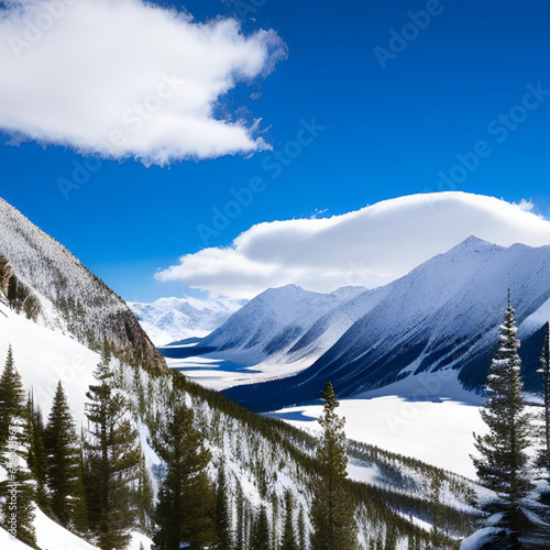 A mountain landscape with snowy peaks and clear blue skies.