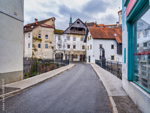 Old buildings alongside Capuchin Bridge street in Skofja Loka village, Slovenia