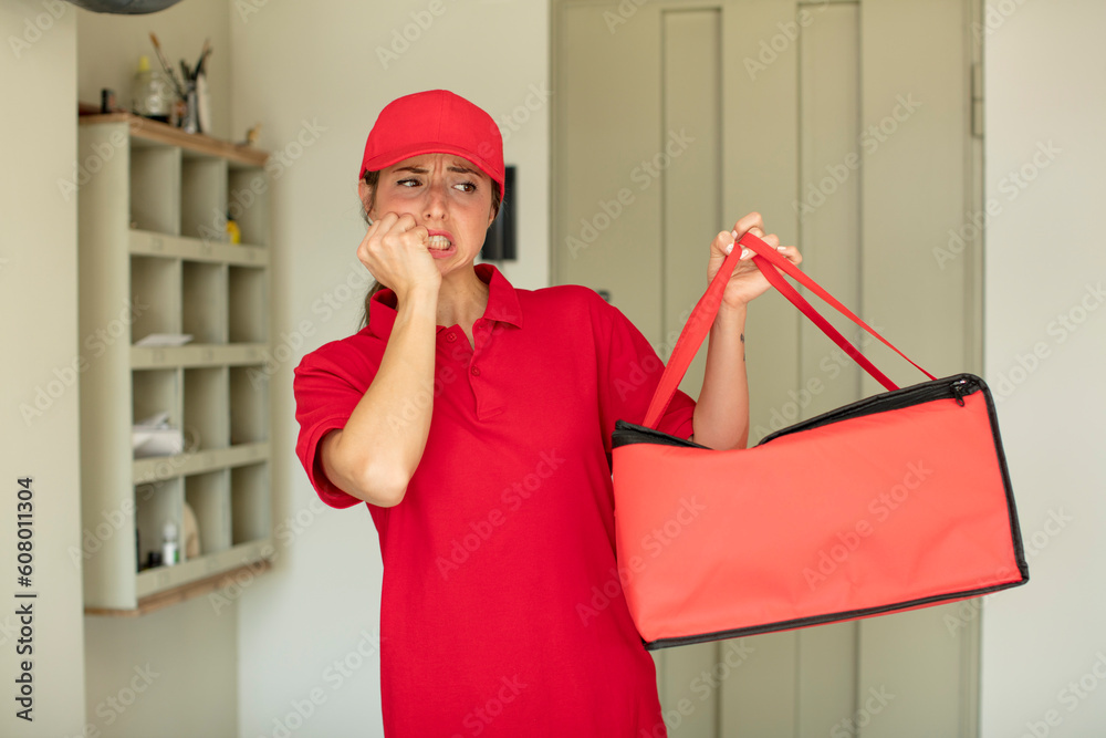 pretty woman feeling scared, worried or angry and looking to the side. pizza delivery concept