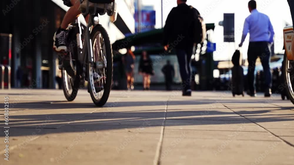 Close up riding a bike on the streets in sunny weather. Close up riding a bike on the streets in sunny weather.