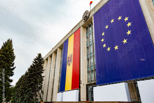 Large flags of Moldova and the European Union on the building of the Government of Moldova