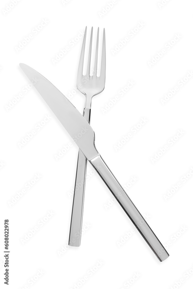 Fork and knife isolated on white, top view. Stylish shiny cutlery set Fork and knife isolated on white, top view. Stylish shiny cutlery set