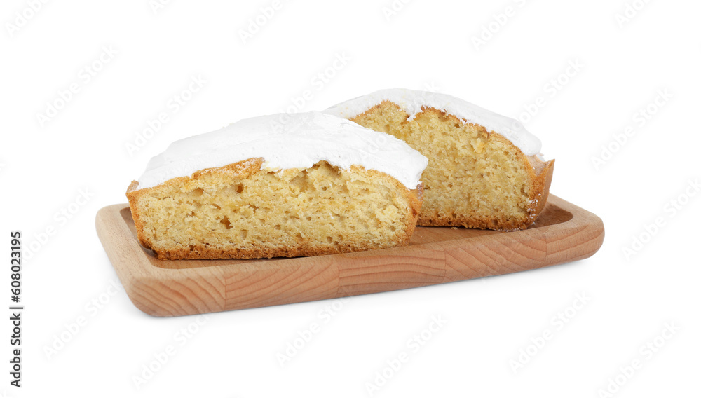 Pieces of homemade yogurt cake with cream on white background Pieces of homemade yogurt cake with cream on white background