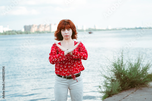 girl crossing her arms, denial pose photo