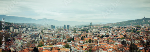 Panoramic view of the spring city of Sarajevo, Bosnia and Herzegovina. A trip to a European city in the mountains with orange roofs