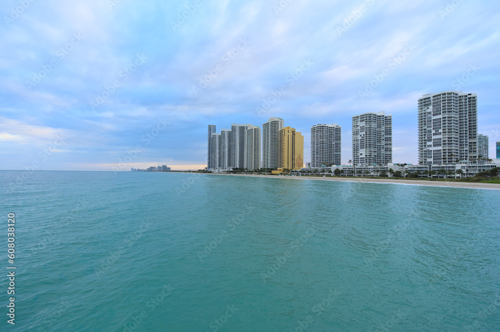 View of Sunny Isles Beach from the pier during cloudy winter eveninf (Florida, USA)