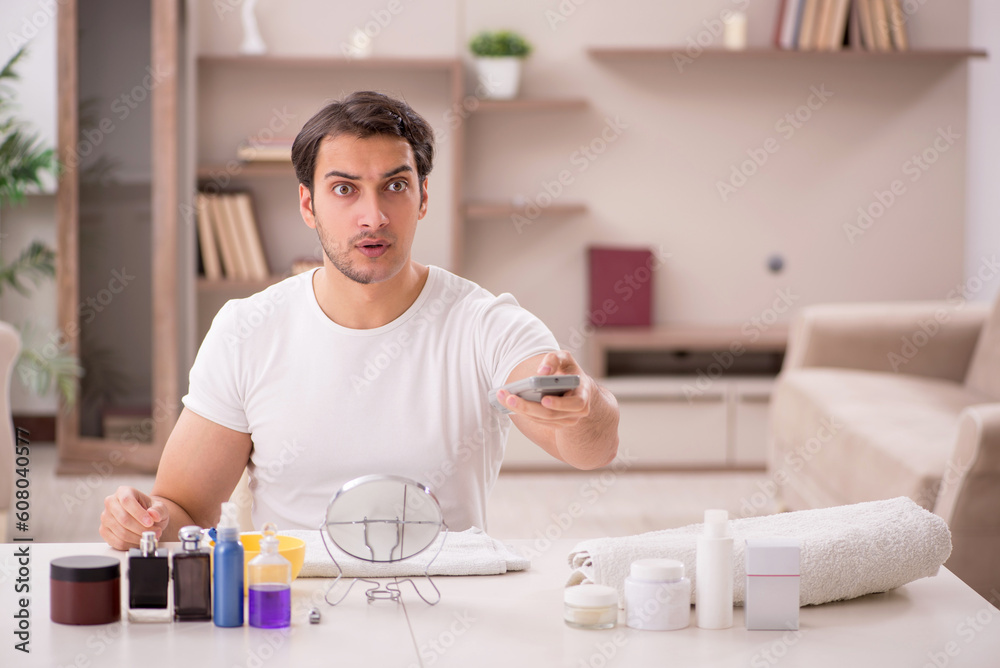 Young man shaving face at home Young man shaving face at home