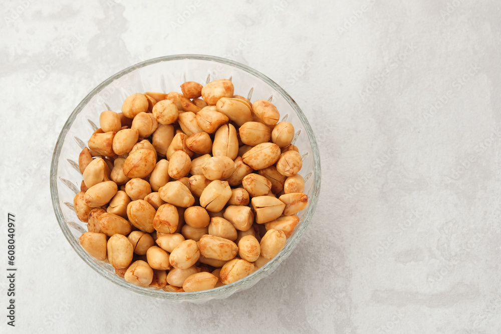 Kacang Goreng Bawang, made from peanuts with garlic and salt. Indonesian traditional snack
Kacang Goreng Bawang, made from peanuts with garlic and salt. Indonesian traditional snack