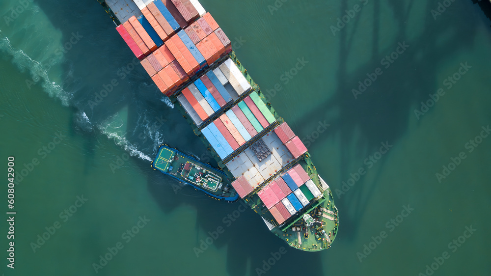 Fototapeta premium Aerial view container cargo ship, Global business import export logistic and transportation freight shipping of international by container cargo ship, Container cargo vessel freight shipping.