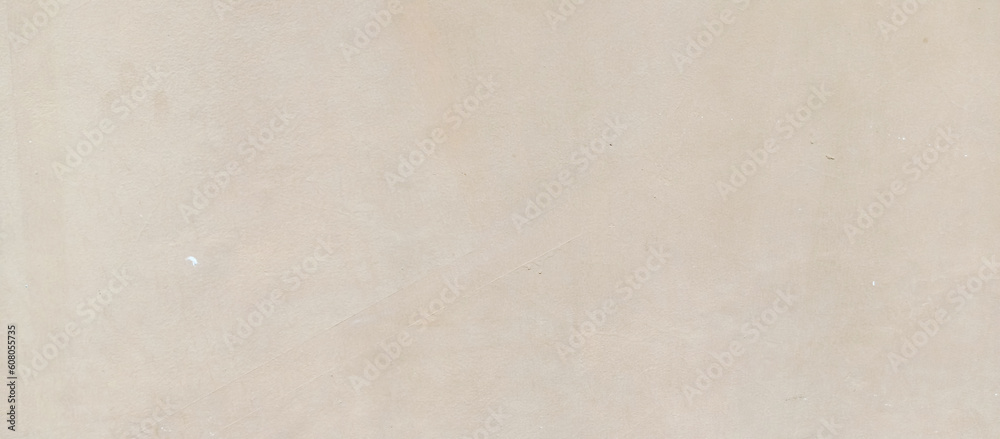 The texture of the gray cement wall on a gray background, taken at close range The texture of the gray cement wall on a gray background, taken at close range
