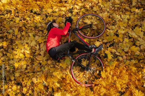 Guy on a bike in the autumn forest