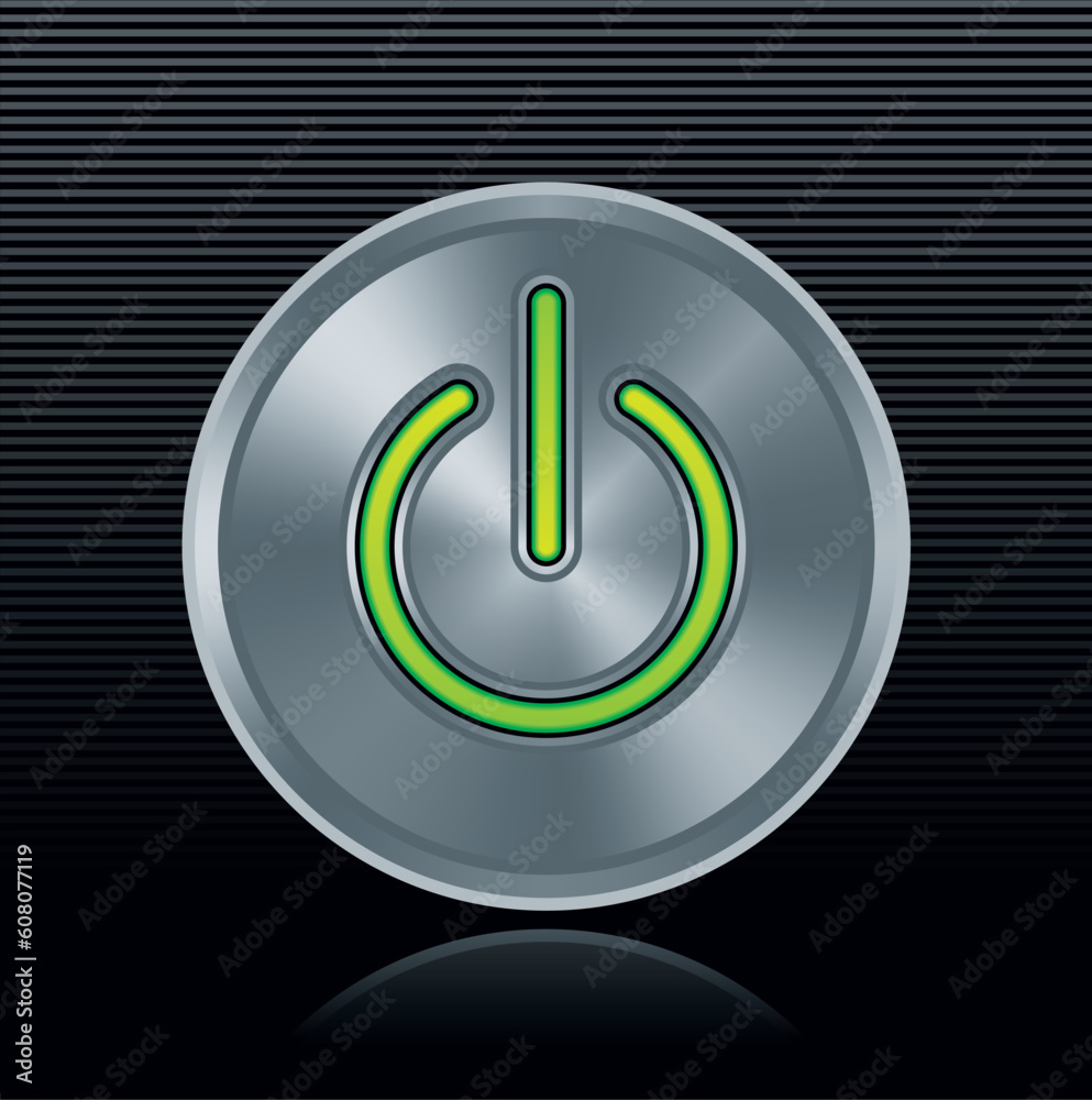 Round metal start button with green light on dark background Round metal start button with green light on dark background