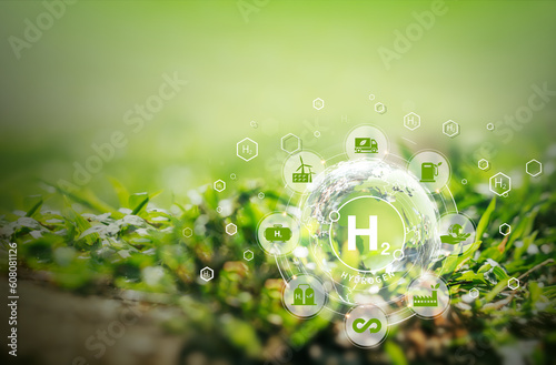 Monlikul's clean hydrogen energy Change the CO2 fuel cell concept to H2, switch to clean hydrogen energy. Globe globe with Clean hydrogen energy icon in eco friendly environment concept. photo