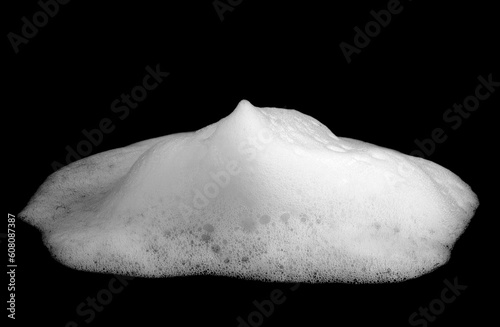 liquid white bubble from soap or shampoo. or shower gel and cosmetics white abstract clean Care and hygiene. isolated on black background 