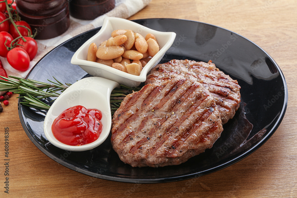 Grilled beef burger cutlet with sauce Grilled beef burger cutlet with sauce