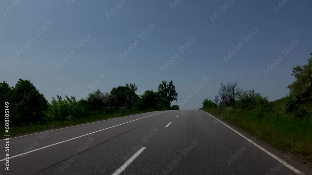 Driving a car on the road. Travel concept. Freedom on the road like a POV dash cam.slow motion Driving a car on the road. Travel concept. Freedom on the road like a POV dash cam.slow motion