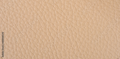 Natural brown or beige leather texture background.