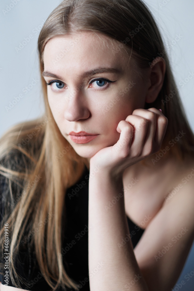 Obraz premium Portrait of a young woman with natural makeup and natural styling.Advertising natural cosmetics.Advertising for a beauty salon.Care cosmetics, face and body skin care. High quality photo