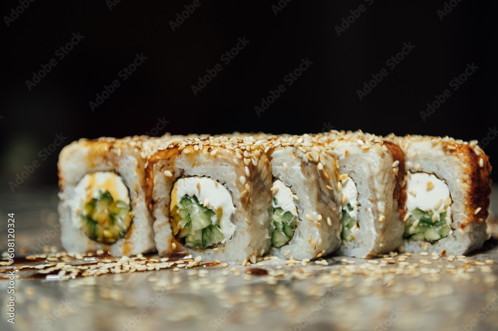 Sai roll sushi with royal prawn, avocado, cream cheese, sesame. Sushi menu. Japanese food Sai roll sushi with royal prawn, avocado, cream cheese, sesame. Sushi menu. Japanese food