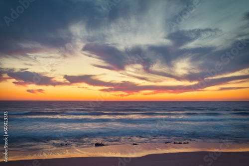 the moment after a beautiful sunset over a beach with pink clouds, Atlantic Ocean, Morocco, Tanger © Axel