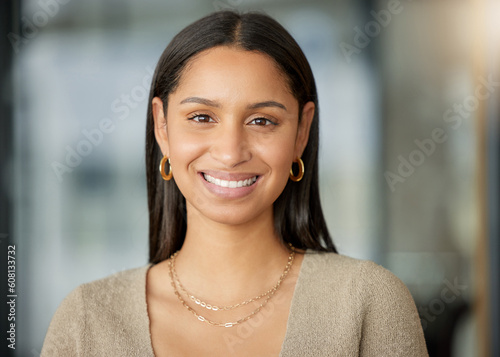 Portrait, smile and business woman, designer or professional in office workplace. Face, creative and happy female entrepreneur, graphic design and person from India with pride for career or job.