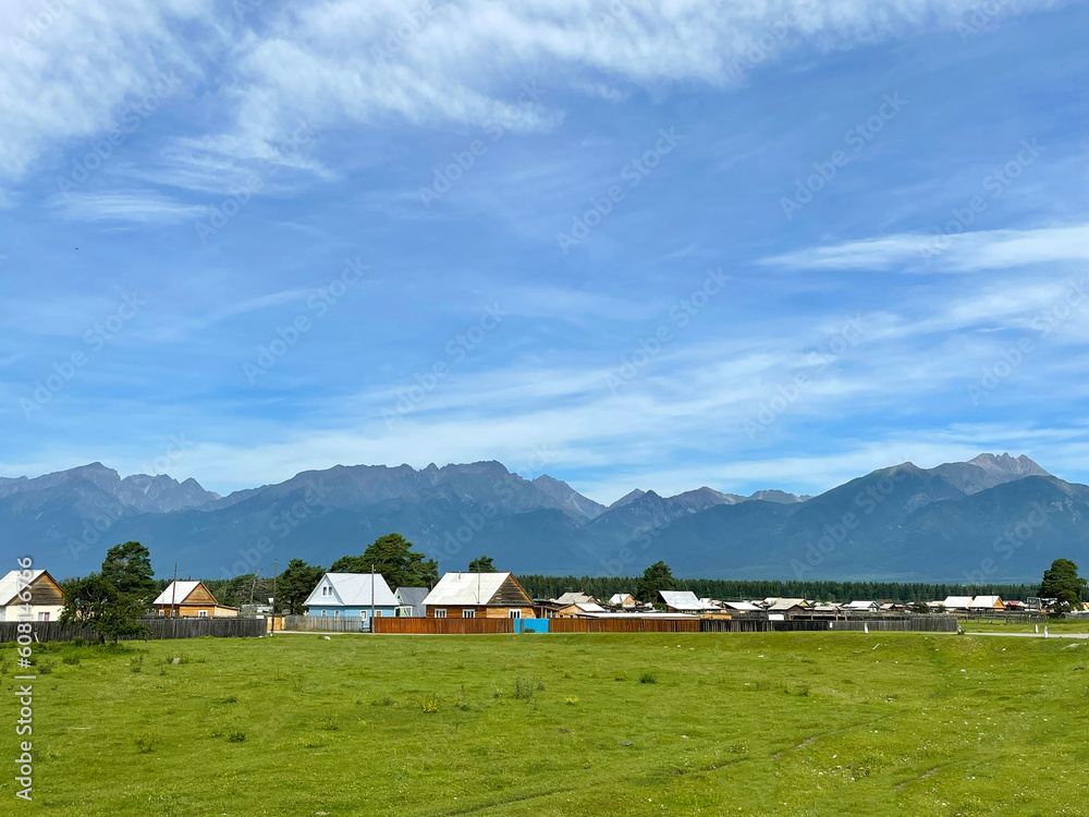 Obraz premium Village in the foothills of the Sayan Mountains, Buryatia, Russia