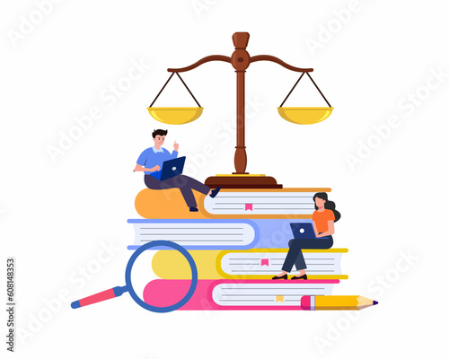 Law and justice education students sitting on laws books next to scales works on a laptop law school.