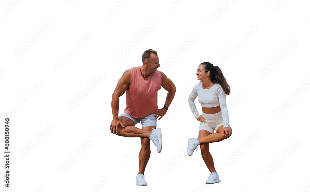 Swedish young adult man in sportswear training with wife against transparent background. Caucasian couple warming up before functional training. Cheerful tanned woman looks at trainer.