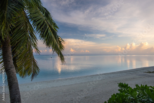 Tropical Cook Islands on the beach at sunrise
