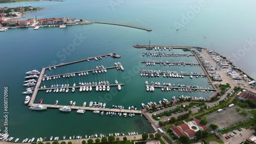 Umag marina port, Umag old town behind. Croatia.