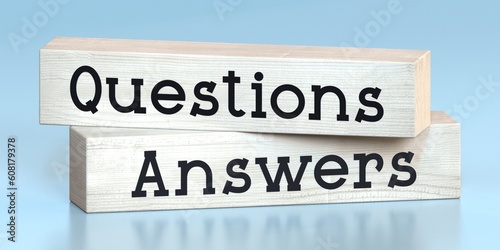Questions, answers - words on wooden blocks - 3D illustration © PX Media