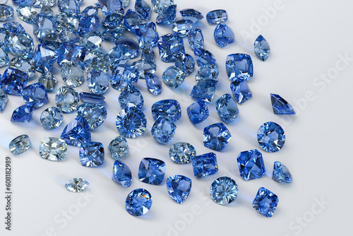 London blue topaz stones scattered on white background.