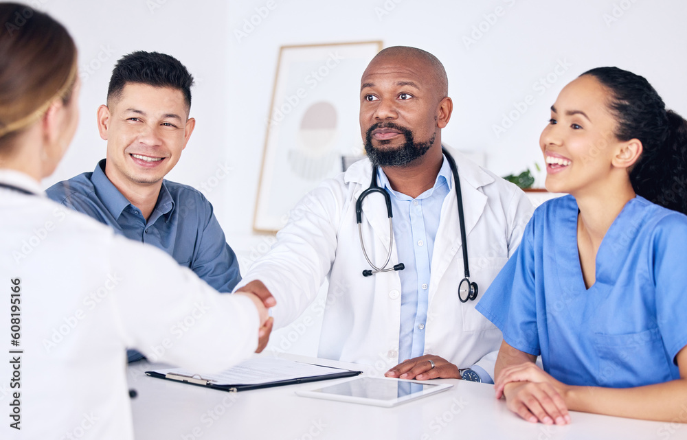 Handshake, teamwork or happy doctors in meeting for success, medical surgery contract or healthcare goals. Partnership, trusted black man or happy woman shaking hands with a nurse in hospital office Handshake, teamwork or happy doctors in meeting for success, medical surgery contract or healthcare goals. Partnership, trusted black man or happy woman shaking hands with a nurse in hospital office