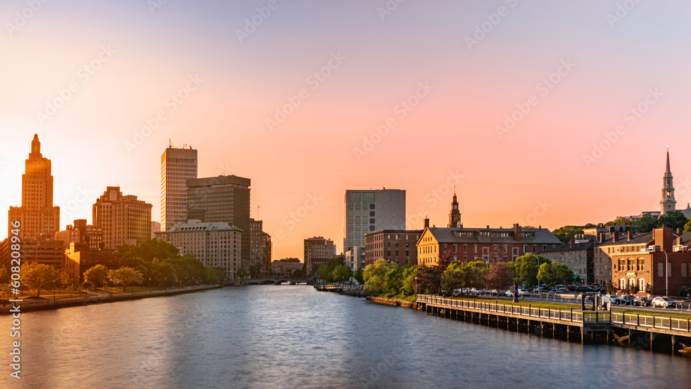 Naklejka premium Providence downtown skyline and buildings at hazy dusk over Providence River Walk, Rhode Island