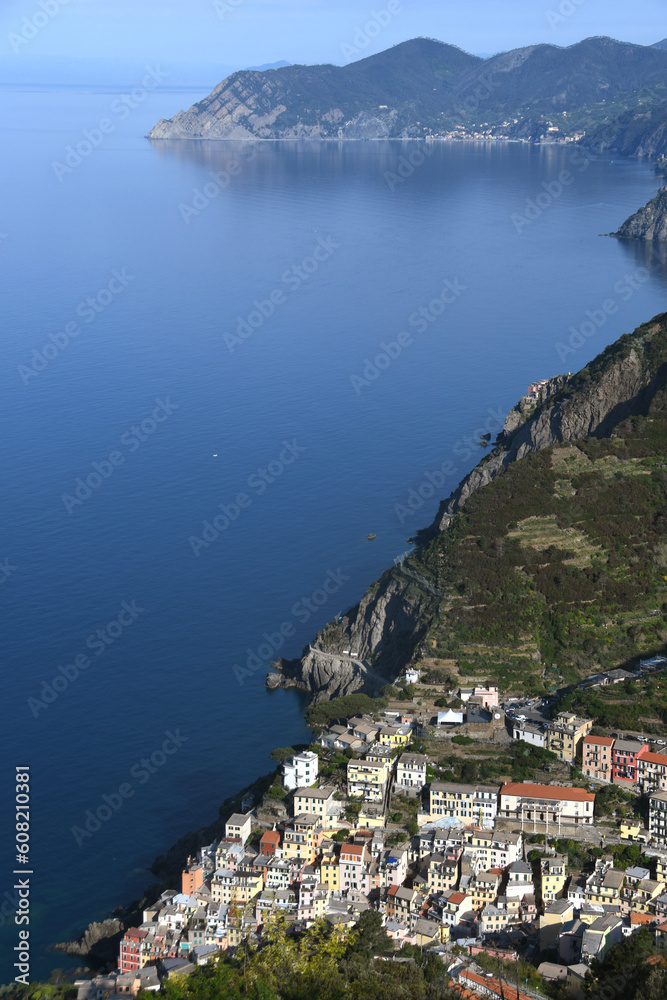 Naklejka premium Riomaggiore is one of the most beautiful and picturesque seaside villages of the Cinque Terre in Liguria.
