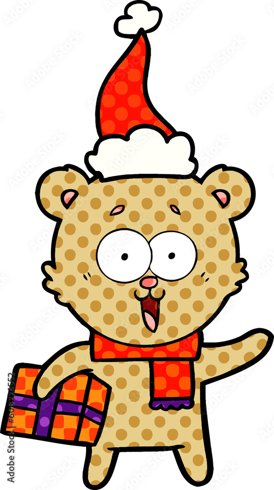 laughing teddy bear with christmas present wearing santa hat laughing teddy bear with christmas present wearing santa hat