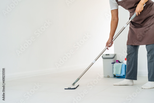 Asian woman House wife or housekeeper cleaning at home..