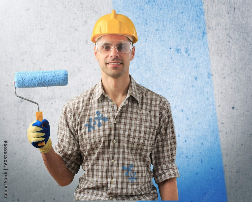 Home renovation concept, person painting an interior Home renovation concept, person painting an interior