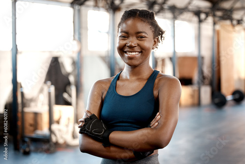 Photos Happy black woman, portrait smile and fitness with arms crossed for workout, exercise or training at the gym