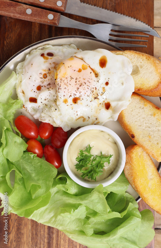 Breakfast: Crispy Toast and Hard-Cooked Eggs Tomato greens, salad dressing
