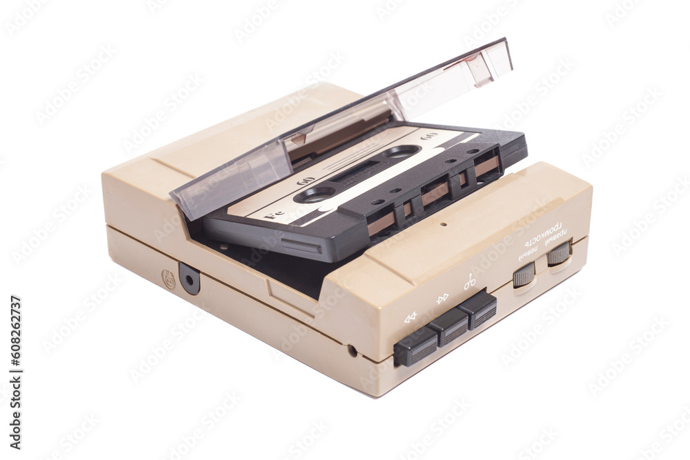 Obraz premium Retro portable stereo cassette recorder from 80s. with audio cassette tape