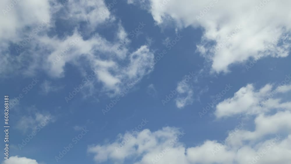 Air plane drone window view time lapse clouds and blue sunny sky loop of white clouds over blue sky with sun rays aerial view drone shooting clouds motion time nature blue sky a white cleat weather 4K Air plane drone window view time lapse clouds and blue sunny sky loop of white clouds over blue sky with sun rays aerial view drone shooting clouds motion time nature blue sky a white cleat weather 4K