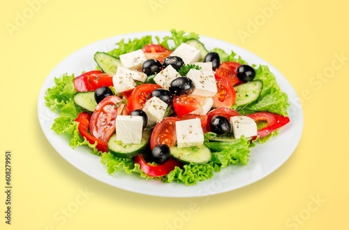 Plate of fresh tasty salad with cheese