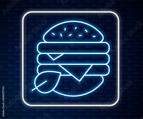 Glowing neon line Vegan food diet icon isolated on brick wall background. Organic, bio, eco symbol. Vegan, no meat, lactose free, healthy, fresh and nonviolent food. Vector