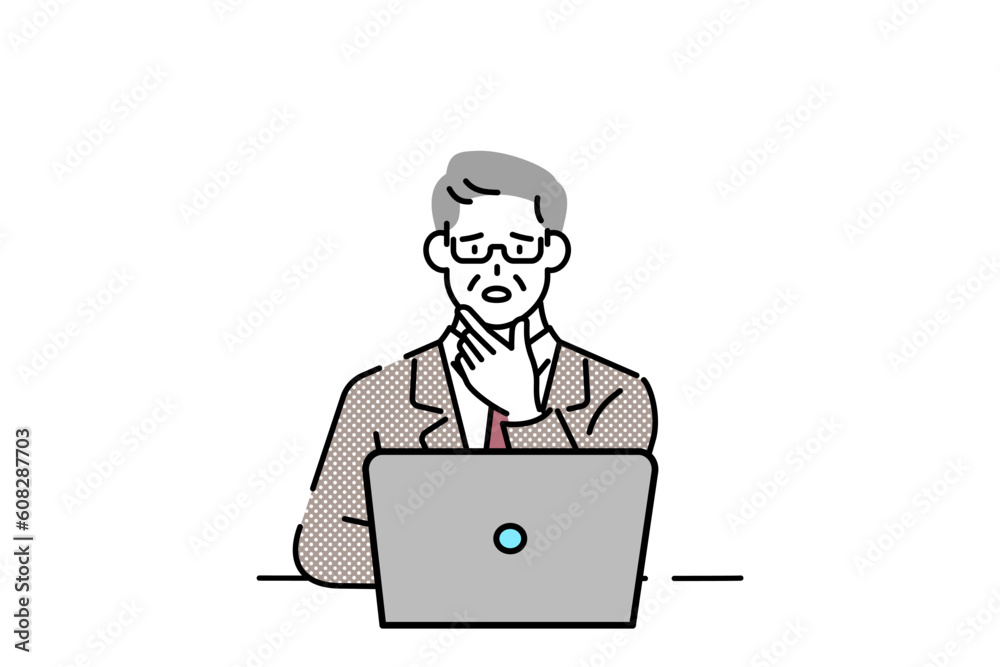 A senior executive sits at his laptop, thinking. A senior executive sits at his laptop, thinking.