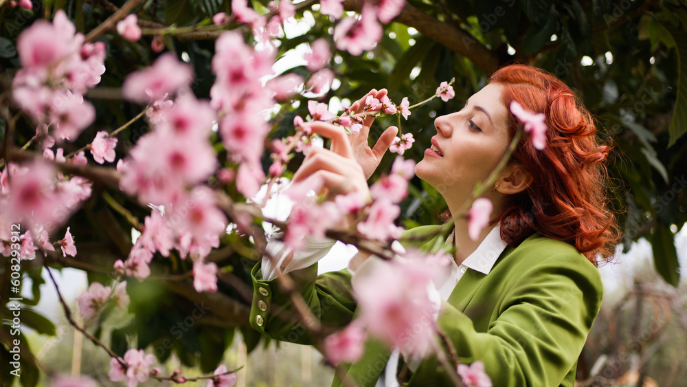 .Girl near pink flowers Tree. .Girl near pink flowers Tree.