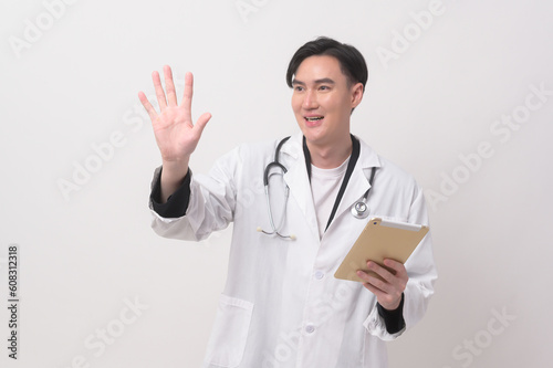 Portrait of male confident doctor over white background studio  healthcare and Medical technology concept.