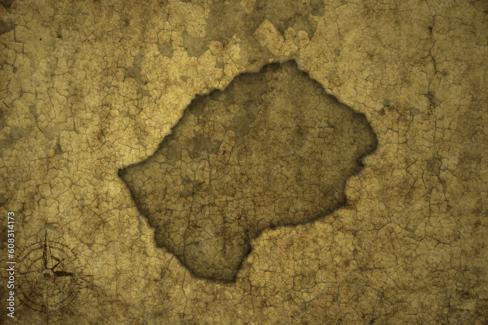 map of lesotho on a old vintage crack paper background .