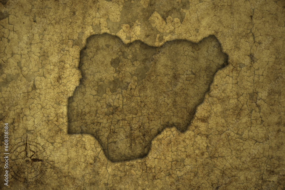 map of nigeria on a old vintage crack paper background .