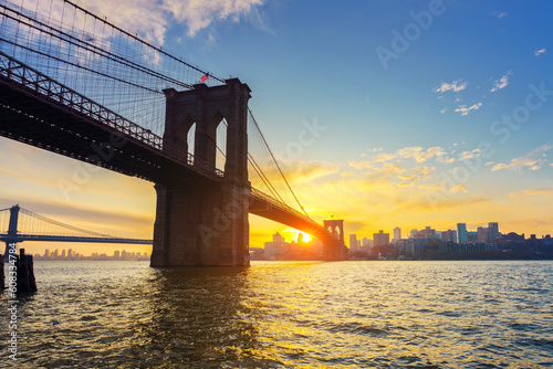 View on Brooklyn bridge and Brooklin at vibrant sunrise, New York City